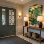 Artist's impression of a hallway with double doors, console table and lamps at Elland Court Care Home, Leeds
